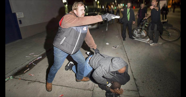 Undercover Cop Draws Gun On Oakland Protestors – PHOTOS