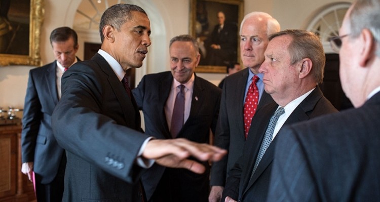 President Barack Obama talks with, from left, Sen. John Thune, R-S.D.; Sen. Charles "Chuck" Schumer, D-N.Y.; Sen. John Cornyn, R-Texas, Minority Whip; Sen. Dick Durbin, D-Ill.; and Senate Majority Leader Mitch McConnell, R-Ky.; after meeting with bipartisan, bicameral leadership of Congress in the Cabinet Room of the White House, Jan. 13, 2015. (Official White House Photo by Pete Souza)